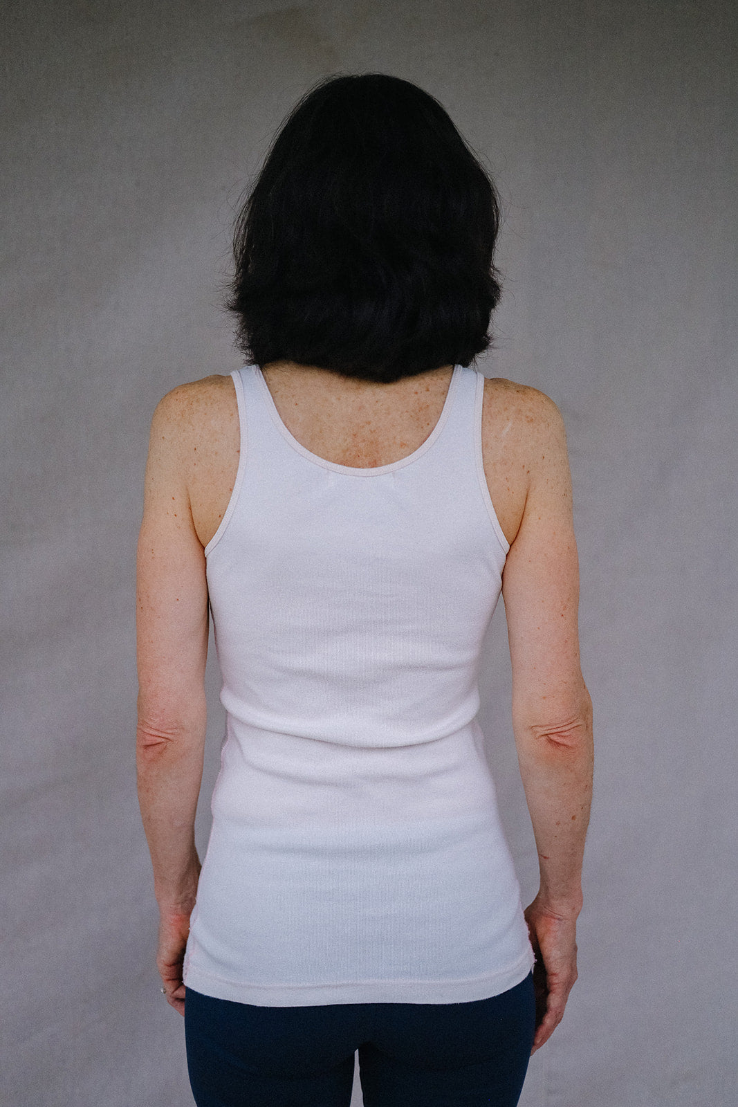 American cotton tank rear full torso view, size XS.